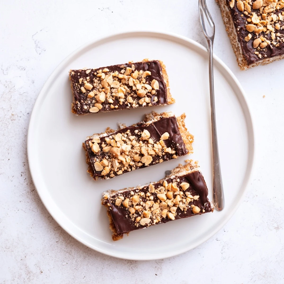 Slices of Peanut Butter Bars served with cold milk, chewy, rich bites