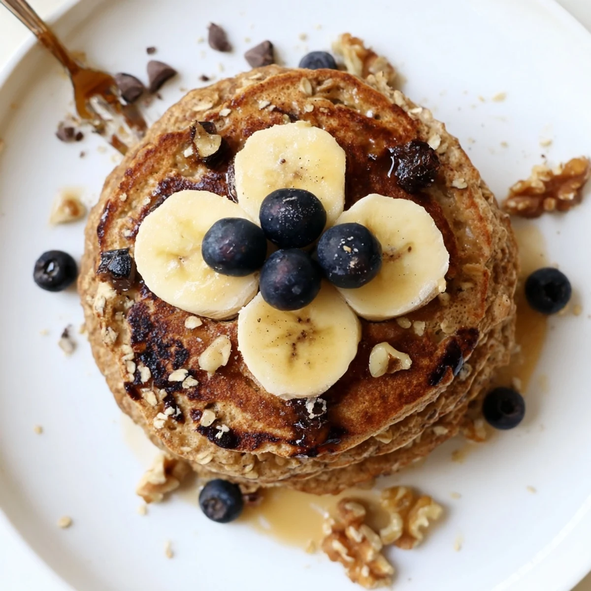 Warm Protein Banana Pancakes on a griddle, steam rising, ready for breakfast